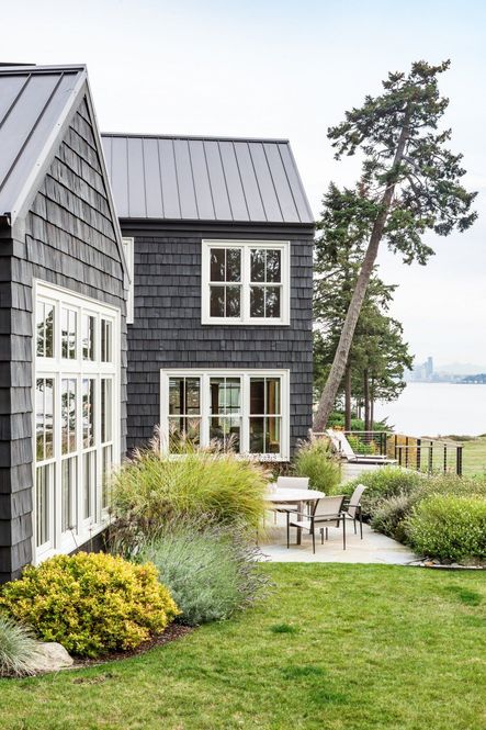 Located in a suburb island of Seattle, this house was built to replace a family’s home lost in a tragic fire. With a modern and elegant goal in mind, Hoedemaker Pfeiffer crafted this home in hopes of keeping the charm of the original one alive.Architecture by Hoedemaker Pfeiffer | Photo by Andrew Giammarco | Project Bainbridge