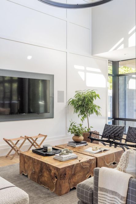 Design by Bodine White | Photography via Scout &amp; Nimble | SHOP THE LOOK: Vert Teak Swirl Coffee Table, Memphis Stool, Set of 2