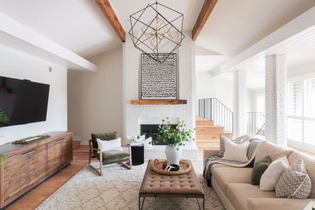 The cooler tones of the Couric Sideboard blend beautifully with the warmer wood floors. Learn more about mixing wood tones here.