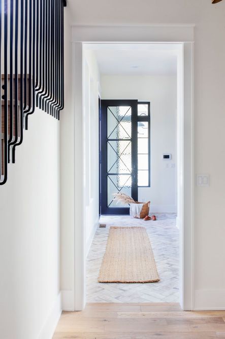 The stairs feature a beautiful custom iron railing…so gorgeous!