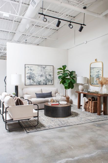 Shop the Look | Isabel Chairs, Accordian Floor Lamp, “A Curious Place” Artwork, Perry Coffee Table, Recycled Glass Vase, Antique Brass Bells, Hyde Large Mirror, Farm House Hall Table