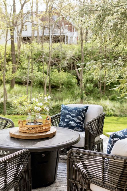 SHOP THE LOOK:  Carver Lounge Chair, Pera Indigo Outdoor Pillow, Jenna Woven Tray Set
