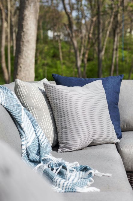 SHOP THE LOOK: Wren Blue &amp; White Throw, Storm Navy Outdoor Pillow, Caplin Light Gray Outdoor Pillow