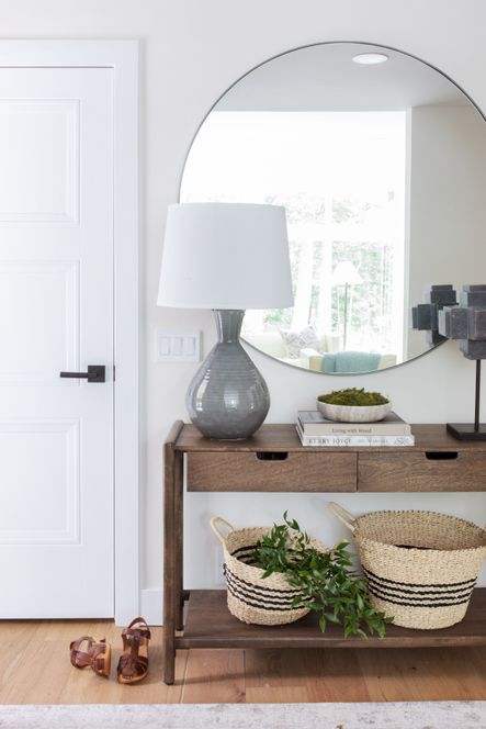 SHOP THE LOOK | Valeria Console Table, Glen Mirror, Ash Table Lamp, Liverpool Rug, Black Marble Sculpture, Galaxy Marble Bowl, Seagrass Baskets