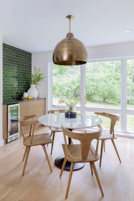 SHOP THE LOOK: Ripley Dining Chair, Powell Dining Table, Navy Colorblock Vase, Earthshine Pendant, Porous Vase, Italian Cutting Board