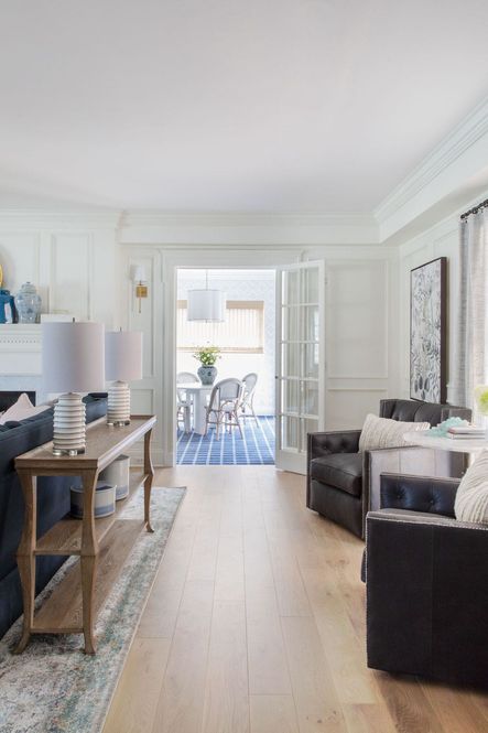 SHOP THE LOOK: Rustic Patina Console Table, Candace Black Leather Chair, Anastasia Silver / Plum Rug, Alida Side Table
