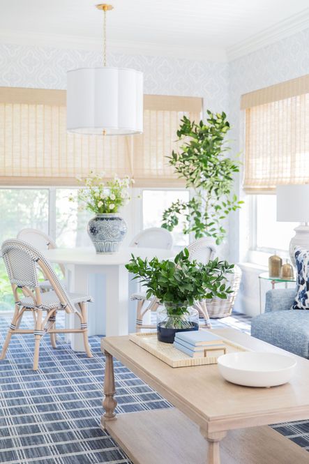 SHOP THE LOOK: Sweeny Five Light Chandelier, Marisa Table Lamp, Blue &amp; White Ginger Jar, Shanghai Loft Dining, Antique Brass Bells, Woven Basket Planter, Sterling Pillows, Navy Colorblock Flower Vase, Bone and Brass Tray, Large Ceramic Bowl, Santa Barbara Cocktail Table