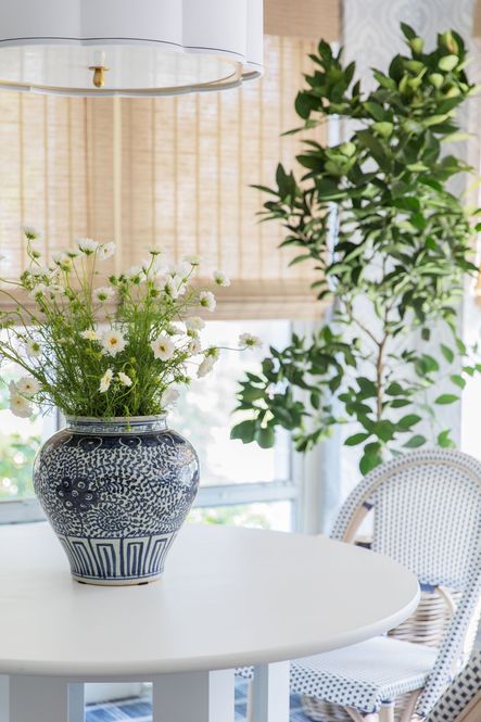 SHOP THE LOOK: Sweeny Five Light Chandelier, Blue &amp; White Ginger Jar, Shanghai Loft Dining Table, Paris Dining Chairs
