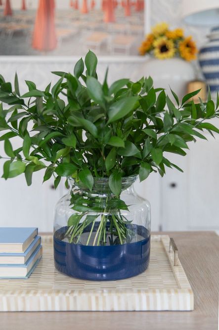 SHOP THE LOOK: Santa Barbara Cocktail Table, Navy Colorblock Flower Vase, Bone and Brass Tray