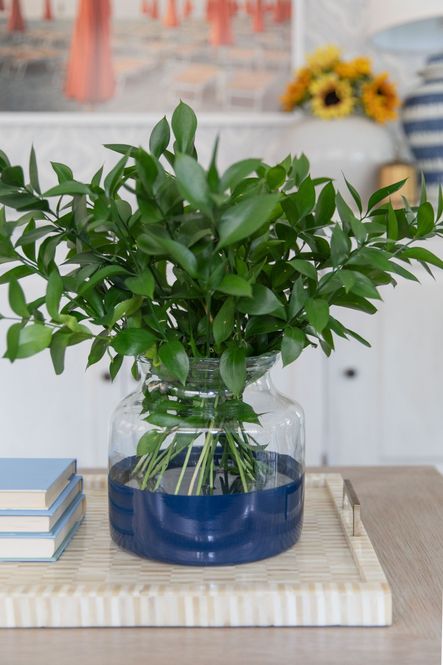 SHOP THE LOOK: Santa Barbara Cocktail Table, Navy Colorblock Flower Vase, Bone and Brass Tray