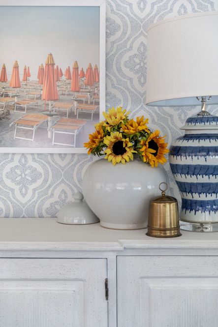 SHOP THE LOOK:  Antique Brass Bells, Large Ceramic Bowl, Ellington Sideboard, Marina Di Ravenna At Dusk, Blue &amp; White Drip Table Lamp, Busan Ginger Jar