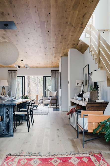 Open sightlines from the entryway to the back porch brighten up the space and allows for natural lighting.
