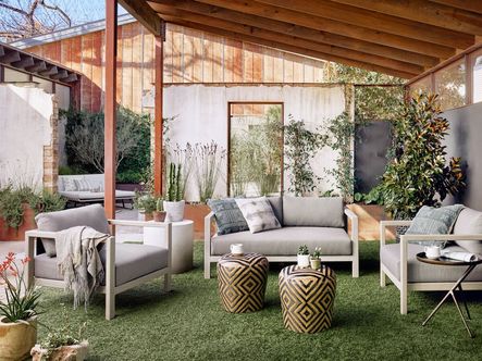SHOP THE LOOK: Lucia Woven Outdoor Stools, Sonoma Outdoor Sofa, Sheridan End Table, Sonoma Outdoor Chair, Schmidt Accent Table, Mud Cloth Print Pillow Set