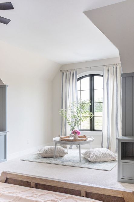 SHOP THE LOOK: Loft Booker Round Cocktail Table, Rosette Denim / Fog Rug
