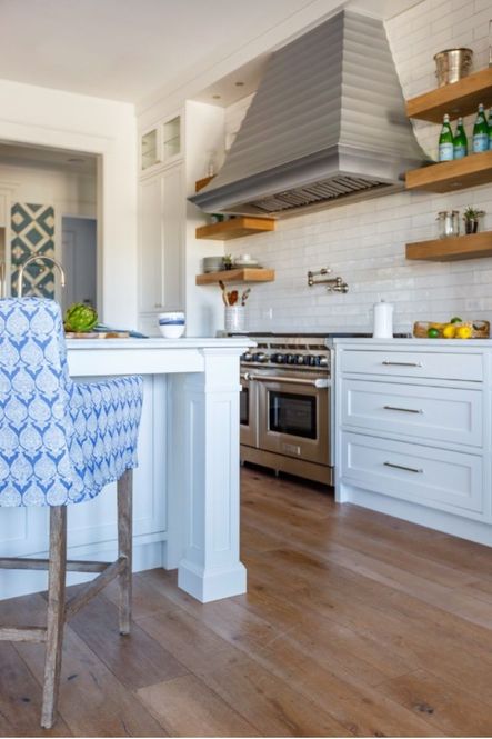 Long horizontal drawers provide perfect storage for kitchen gadgets.