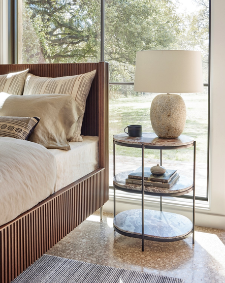 Image via Four Hands | SHOP THE LOOK: Felix Round Nightstand