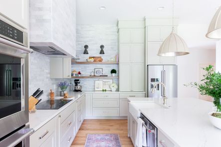 Extending the tile from the countertops to the ceiling helped to elongate the space and really highlight those 11 foot ceilings.