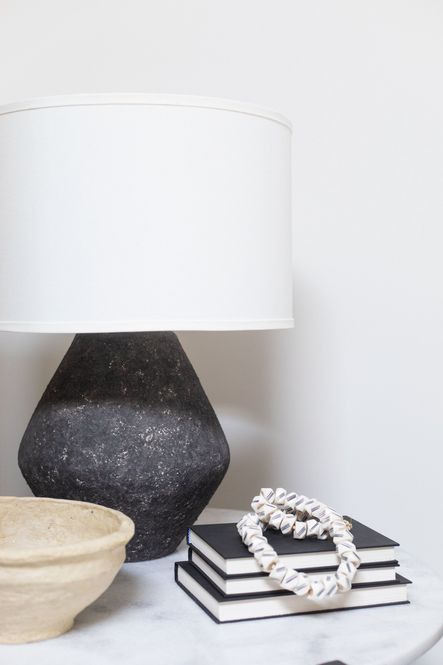 SHOP THE LOOK: Artifact Graystone Table Lamp, Paper Mache Bowl, Diamond Triple Lines Kenya Cow Bone Beads