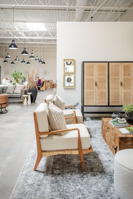 SHOP THE LOOK:  Caprice Cabinet, Allister Chairs, Inanimate Object VII, Inanimate Object I, Lincoln Rug, Levi Ivory Pillow Set
